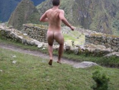 A man poses nude at Machu Picchu, in an image taken from the Facebook page "Naked in monuments."