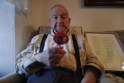 Martín de la Torre holds the rattle his mother took to her execution in 1936.