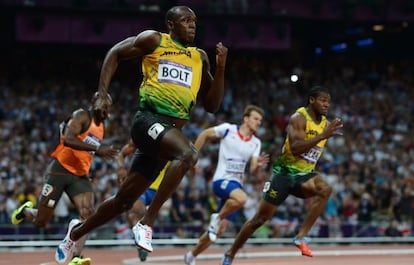 Bolt y Blake, en la final de 200m.