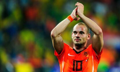 Wesley Sneijder celebra la victoria de la selección holandesa frente a Brasil, y que ha supuesto su clasificación frente para las semifinales.