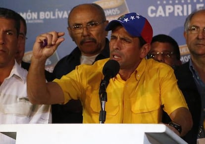 Venezuela&#039;s opposition leader Henrique Capriles gestures during a news conference in Caracas on Monday. 