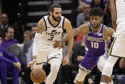 Ricky Rubio, perseguido por Frank Mason.