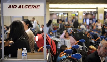 Passengers at an Air Algérie desk in a French airport in 2011.