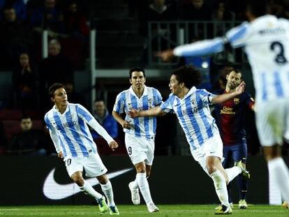 Iturra celebra un gol con el Málaga ante el Barça