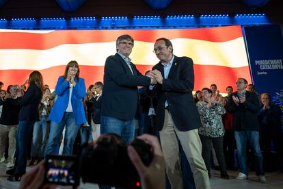 El expresident y cabeza de lista de JxCat para el 12M, Carles Puigdemont, junto a Josep Rull.