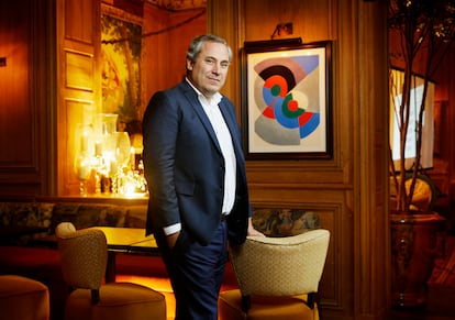Benjamin Patou, in front of a painting by Sonia Delaunay from his private collection. Patou is the founder and CEO of the Moma group. "My mission is to create human adventures and bring together talent. Lázaro and Mory are two juggernauts in this exceptional place," he says. 