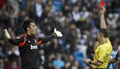 Real Madrid goalkeeper Antonio Ad&aacute;n is shown the red card on Sunday.