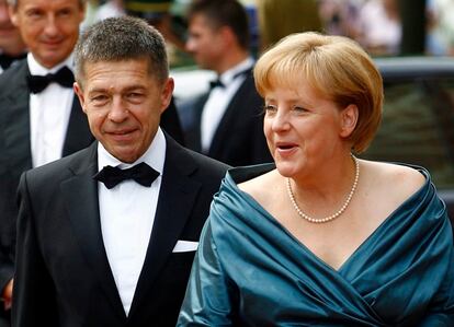 German Chancellor Merkel and her husband Sauer arrive on the red carpet for the opening of the Bayreuth Wagner opera festival