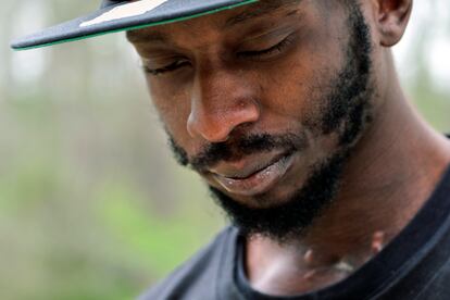 Michael Corey Jenkins stands outside Taylor Hill Church in Braxton, Miss