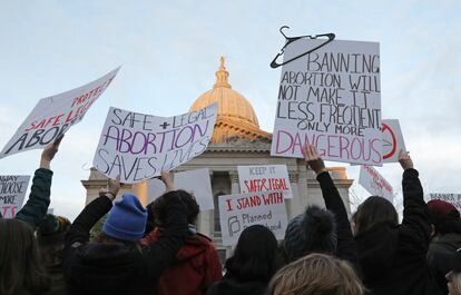 Demonstrators protest outside the state Capitol in Madison, Wis., Tuesday, May 3, 2022