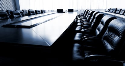 Conference table and chairs in modern meeting room