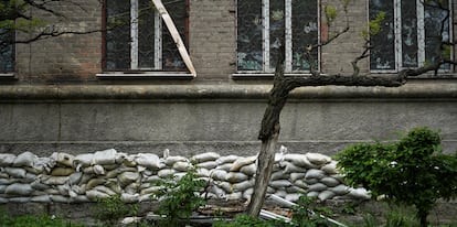 Sandbags line the wall of a school in Kostiantynivka.