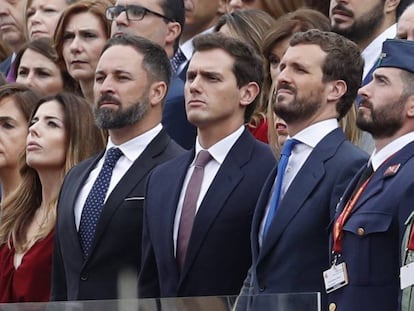 De izquierda a derecha, Abascal, Rivera y Casado, en el desfile del 12-O.