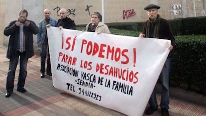 Members of the Basque Family Association hold a protest where the woman died in Barakaldo Friday.