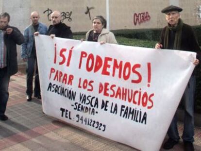 Members of the Basque Family Association hold a protest where the woman died in Barakaldo Friday.