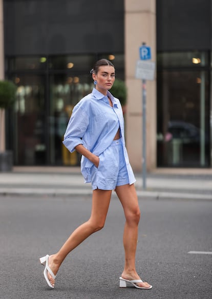 The look has also hit the streets. In this image, Celine Bethmann wears a blue striped Worst Behavior two piece and white Stradivarius heels. 