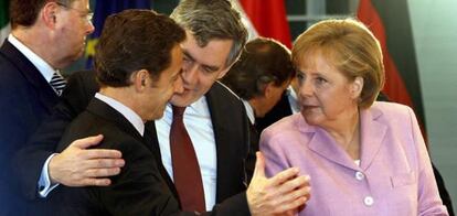 Nicolas Sarkozy, Gordon Brown y Angela Merkel.