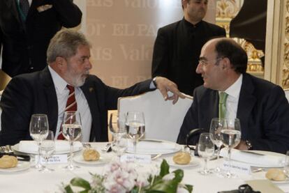 Lula da Silva charla con el presidente de Iberdrola, Ignacio Sánchez Galán.