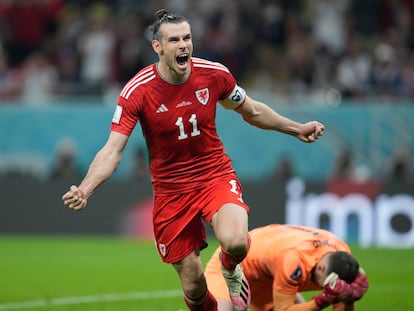 Wales' Gareth Bale celebrates after scoring his side's opening goal during the World Cup, group B soccer match between the United States and Wales, at the Ahmad Bin Ali Stadium in Doha, Qatar, Monday, Nov. 21, 2022. (AP Photo/Ashley Landis)
