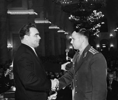 Soviet leader Leonid Brezhnev bestowing Gagarin with the Order of Lenin and Hero of the Soviet Union on April 14, 1961, just two days after his flight.