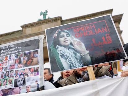 People take part in a protest against the Islamic regime of Iran following the death of Mahsa Amini, in Berlin, Germany, December 10, 2022.