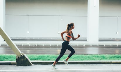 Sportswoman running in the city