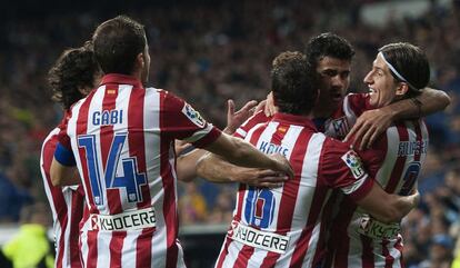 Los jugadores del Atlético celebran el primer gol