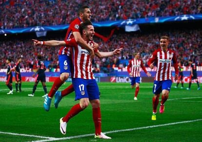 Saúl, Koke y Griezmann celebran el 1-0