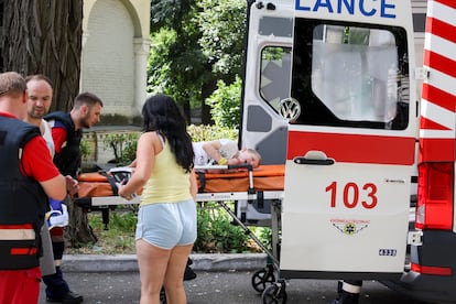 A child is taken by ambulance near the Ohmatdyt children's hospital following a Russian attack in the city of kyiv on Monday.