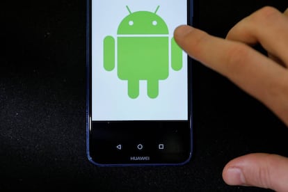 Android logo is displayed on a Huawei smartphone in this illustration picture