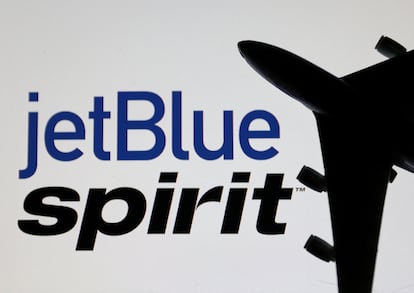Airplane model is placed on displayed Spirit Airlines and jetBlue Airways logos in this illustration taken, June 21, 2022