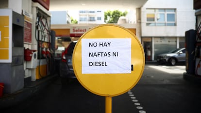 A sign reading "There is no NAFTAS (gasoline) nor diesel" is seen at a gas station during a gasoline shortage in Buenos Aires, Argentina October 30, 2023.