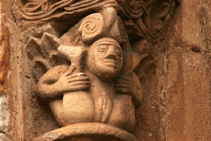 A woman showing her sexual organs on a capital at the Collegiate Church of San Pedro de Cervatos (Cantabria).