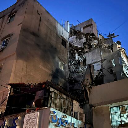 A general view shows a damaged building that was hit by an Israeli airstrike in the southern suburbs of Beirut, Lebanon, Tuesday, July 30, 2024. An Israeli airstrike hit Hezbollah's stronghold south of Beirut Tuesday evening causing damage, a Hezbollah official and the group's TV station said. (AP Photo/Hussein Malla)