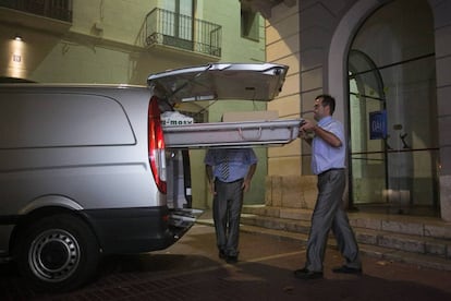 Funeral workers at the Dalí exhumation in Figueres.