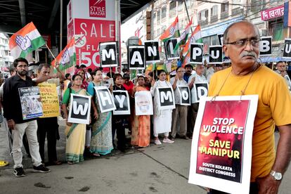 National Congress activists hold placards and shout slogans against Prime Minister Narendra Modi during a protest march over sexual violence against women in the northeastern state of Manipur and the ongoing conflict between two ethnic groups, Kukis and Meiteis, in Kolkata, Eastern India 28 July 2023