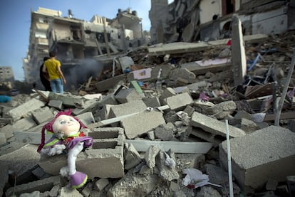 A doll of a Palestinian girl, among the rubble of a building destroyed after the Israeli airstrike on a street in Gaza, on July 11, 2014.