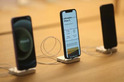 FILE PHOTO: IPhone 12 phones are seen at the new Apple Store on Broadway in downtown Los Angeles