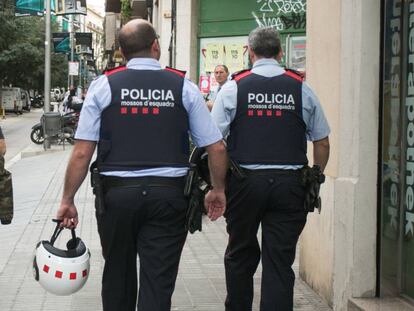 Officers with Catalonia's Mossos d' Esquadra police force.