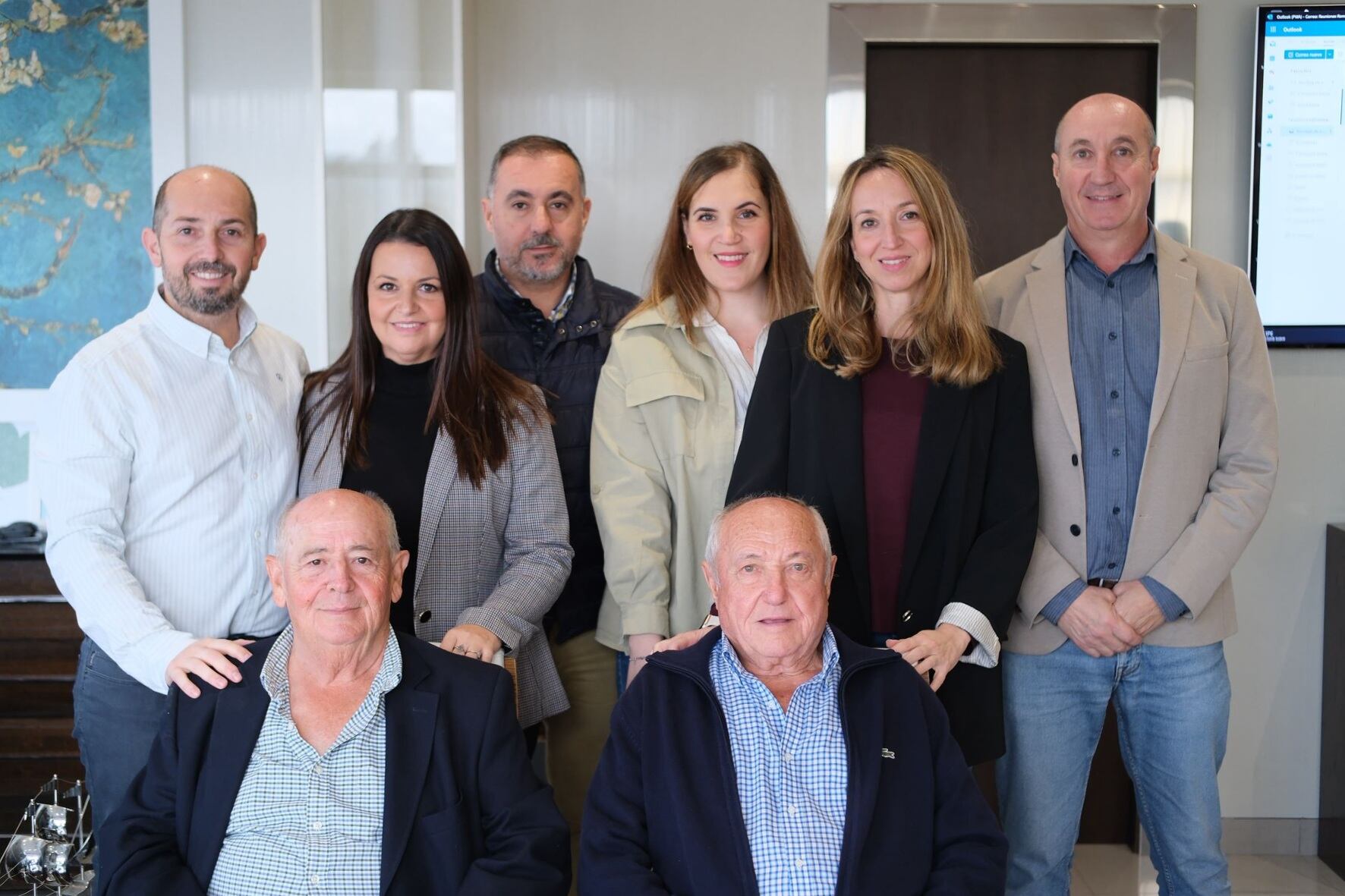 Imagen del equipo directivo junto a los fundadores de Román y Martos.