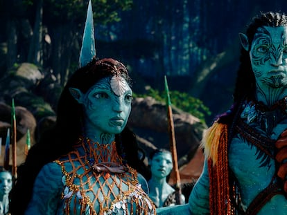 This image released by 20th Century Studios shows Kate Winslet, as Ronal, left, and Cliff Curtis, as Tonowari, in a scene from "Avatar: The Way of Water."