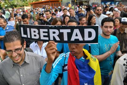 Opposition demonstrators take part in a protest against the government of President Nicolás Maduro.