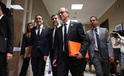 Josep Rull, Jordi Sànchez y Jordi Turull salen del Congreso tras recoger sus actas de diputados el pasado lunes.