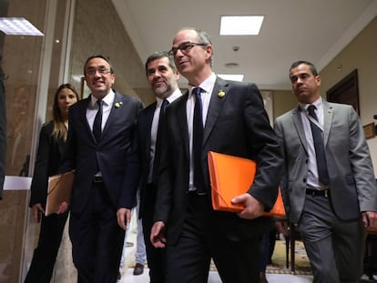 Josep Rull, Jordi Sànchez y Jordi Turull salen del Congreso tras recoger sus actas de diputados el pasado lunes.