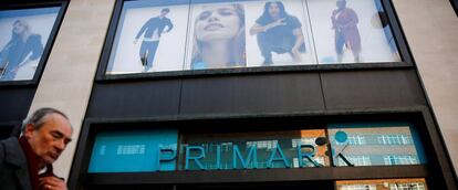 FILE PHOTO: Shoppers walk past a Primark store on Oxford Street in London