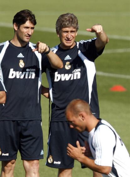 Pellegrini (a la derecha), en un entrenamiento del Madrid.