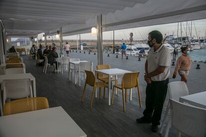 A near-empty restaurant in the port of Corralejo, Fuerteventura in Spain's Canary Islands.