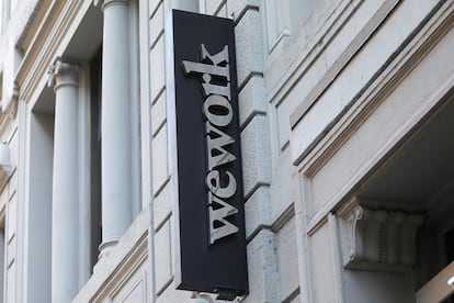 A sign is seen above the entrance to the WeWork corporate headquarters in Manhattan, New York, U.S., November 21, 2019.