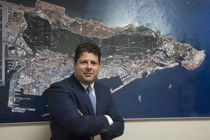Fabian Picardo, pictured last Friday in front of an aerial photograph of Gibraltar in his office building.