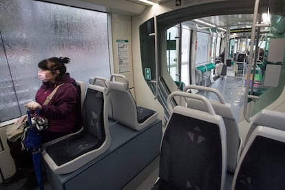 A commuter riding a bus in downtown Barcelona last week.